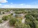 This aerial view highlights a home in a rural setting, blending privacy with community at 14545 Battenwood Dr, Spring Hill, FL 34610