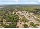 Bird's-eye view of a residential area with scattered homes and lush foliage at 14545 Battenwood Dr, Spring Hill, FL 34610
