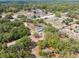 Explore the neighborhood from above with its large lots, mature trees, and well-kept yards at 14545 Battenwood Dr, Spring Hill, FL 34610