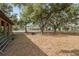 Expansive backyard with mature trees and open spaces, offering privacy and natural beauty at 14545 Battenwood Dr, Spring Hill, FL 34610