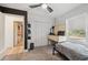 Cozy bedroom featuring built in desk, neutral walls, carpeted flooring, and lots of natural light at 14545 Battenwood Dr, Spring Hill, FL 34610