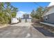Two-car garage with a well-maintained driveway, providing convenient parking and curb appeal at 14545 Battenwood Dr, Spring Hill, FL 34610
