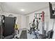 Workout room with treadmill, weight machine, and other fitness equipment to help you stay active and healthy at 14545 Battenwood Dr, Spring Hill, FL 34610