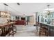 Open concept living area with modern kitchen, dining room, and Gathering room at 14545 Battenwood Dr, Spring Hill, FL 34610