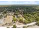 Discover this beautiful neighborhood from above, with its spacious lots and lush surroundings at 14545 Battenwood Dr, Spring Hill, FL 34610