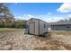 Exterior view of a storage shed in the backyard, providing ample space for tools and equipment at 14545 Battenwood Dr, Spring Hill, FL 34610