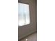 This shot shows a window with blinds at 1514 Citrine Trl, Tarpon Springs, FL 34689