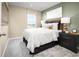 Bedroom with plush carpet, a large window, and a comfy bed at 20334 Lou Angela Ln, Lutz, FL 33558