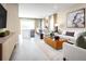 Open concept living room featuring recessed lights, comfortable furniture and tile floors at 20334 Lou Angela Ln, Lutz, FL 33558