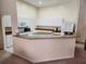 Bright open kitchen with island, breakfast bar, granite counters, and stainless appliances at 21008 Sunpoint Way # 204, Lutz, FL 33558