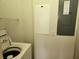Simple laundry area with standard washer and dryer hookups and utility panel at 21041 Sunpoint Way # 202, Lutz, FL 33558