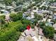 Aerial view of a property amidst a vibrant neighborhood at 2660 Orangewood Ct, Palm Harbor, FL 34684