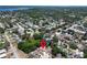 Aerial view of the property within a residential neighborhood at 2660 Orangewood Ct, Palm Harbor, FL 34684