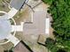 Aerial view of a charming single-Gathering home with a two-car garage and a well-maintained yard at 2660 Orangewood Ct, Palm Harbor, FL 34684