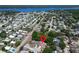 Aerial view of a neighborhood near a large body of water at 2660 Orangewood Ct, Palm Harbor, FL 34684