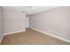Bright and open bedroom features tiled floors and ample closet space at 2660 Orangewood Ct, Palm Harbor, FL 34684