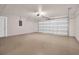 Spacious two-car garage with smooth flooring and automatic door at 2660 Orangewood Ct, Palm Harbor, FL 34684