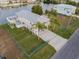 Beautiful waterfront home with lush landscaping, a long driveway, and a private dock at 3340 Oleander Dr, Hernando Beach, FL 34607