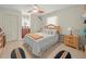 A cozy bedroom with a ceiling fan, and bedside tables at 3340 Oleander Dr, Hernando Beach, FL 34607