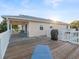 Spacious outdoor deck with ample seating, perfect for enjoying scenic views and outdoor dining at 3340 Oleander Dr, Hernando Beach, FL 34607