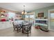 Bright dining area with modern decor, built in shelves, and a view of the water at 3340 Oleander Dr, Hernando Beach, FL 34607