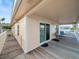 Covered deck with sliders and furniture offering outdoor entertaining and lounging space at 3340 Oleander Dr, Hernando Beach, FL 34607