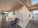 Covered deck with furnishings offering outdoor entertaining and lounging space at 3340 Oleander Dr, Hernando Beach, FL 34607