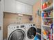 A well-organized laundry room with modern washer and dryer at 3340 Oleander Dr, Hernando Beach, FL 34607