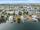 Waterfront vacant lot, highlighted in red, offering direct access to the Gulf, with nearby boating and fishing at 3340 Oleander, Hernando Beach, FL 34607