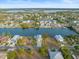 Wide aerial shot of vacant waterfront property surrounded by canals and a Gulf community at 3340 Oleander, Hernando Beach, FL 34607