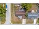 Aerial view of a single-Gathering home with a fenced backyard and mature trees at 3638 Bigelow Dr, Holiday, FL 34691