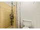 Bathroom with functional shower, wall shelving and shower curtain at 3638 Bigelow Dr, Holiday, FL 34691