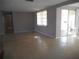 Bright living room space with sliding doors leading to the outside patio at 3638 Bigelow Dr, Holiday, FL 34691