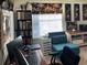 Bright office featuring a dark desk, and lots of wall decor at 4047 Eagle Cove West Dr, Palm Harbor, FL 34685