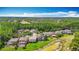 Aerial view of homes and water features in community at 4207 Fishermans Lake Dr, Lutz, FL 33558