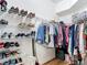 Walk in closet with shelving to store shoes and hanging clothes at 4207 Fishermans Lake Dr, Lutz, FL 33558