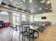 An ample dining area offering tables and chairs for social gatherings and dining experiences at 4207 Fishermans Lake Dr, Lutz, FL 33558