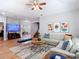 Spacious living room with modern decor, comfortable seating, and access to the outdoor patio at 4207 Fishermans Lake Dr, Lutz, FL 33558