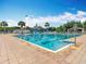 Large community pool with clear blue water and ample space for swimming laps at 4207 Fishermans Lake Dr, Lutz, FL 33558
