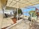 Spacious patio area with a picturesque lake view, perfect for outdoor relaxation at 4333 Baden Dr, Holiday, FL 34691