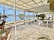 Spacious screened patio with view of the lake at 4333 Baden Dr, Holiday, FL 34691