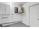 The utility room includes a water heater, and ample storage at 4369 Marine Pkwy, New Port Richey, FL 34652