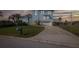Lovely two-story home featuring an attached garage and well-maintained lawn at 5040 Waterside Dr, Port Richey, FL 34668