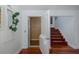 Features an indoor elevator and hardwood stairs at 5040 Waterside Dr, Port Richey, FL 34668