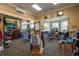 The pro shop displays golf apparel and accessories with ample natural light from bay windows at 5931 Precious View Ct, New Port Richey, FL 34655