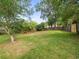 Large backyard with new lawn, ready for fun at 606 Howell Ave, Brooksville, FL 34601