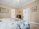 A bedroom featuring neutral walls, carpet, and an open doorway to another room at 606 Howell Ave, Brooksville, FL 34601