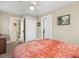 Cozy bedroom featuring a plush bed and access to a private bathroom at 606 Howell Ave, Brooksville, FL 34601