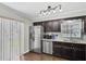 Modern kitchen with stainless steel appliances and granite countertops at 6219 Wilds Dr # 11A, New Port Richey, FL 34653