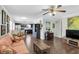 Inviting living room with hardwood floors, comfortable seating, and a ceiling fan at 6219 Wilds Dr # 11A, New Port Richey, FL 34653